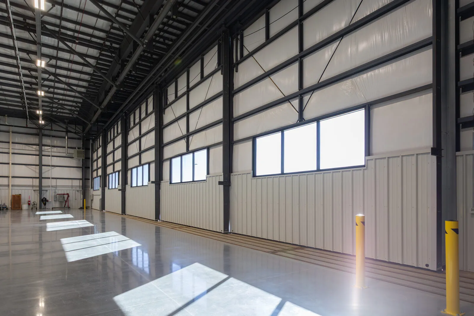 Clear-span interior of Causey Aviation's hangar at Greensboro PTI