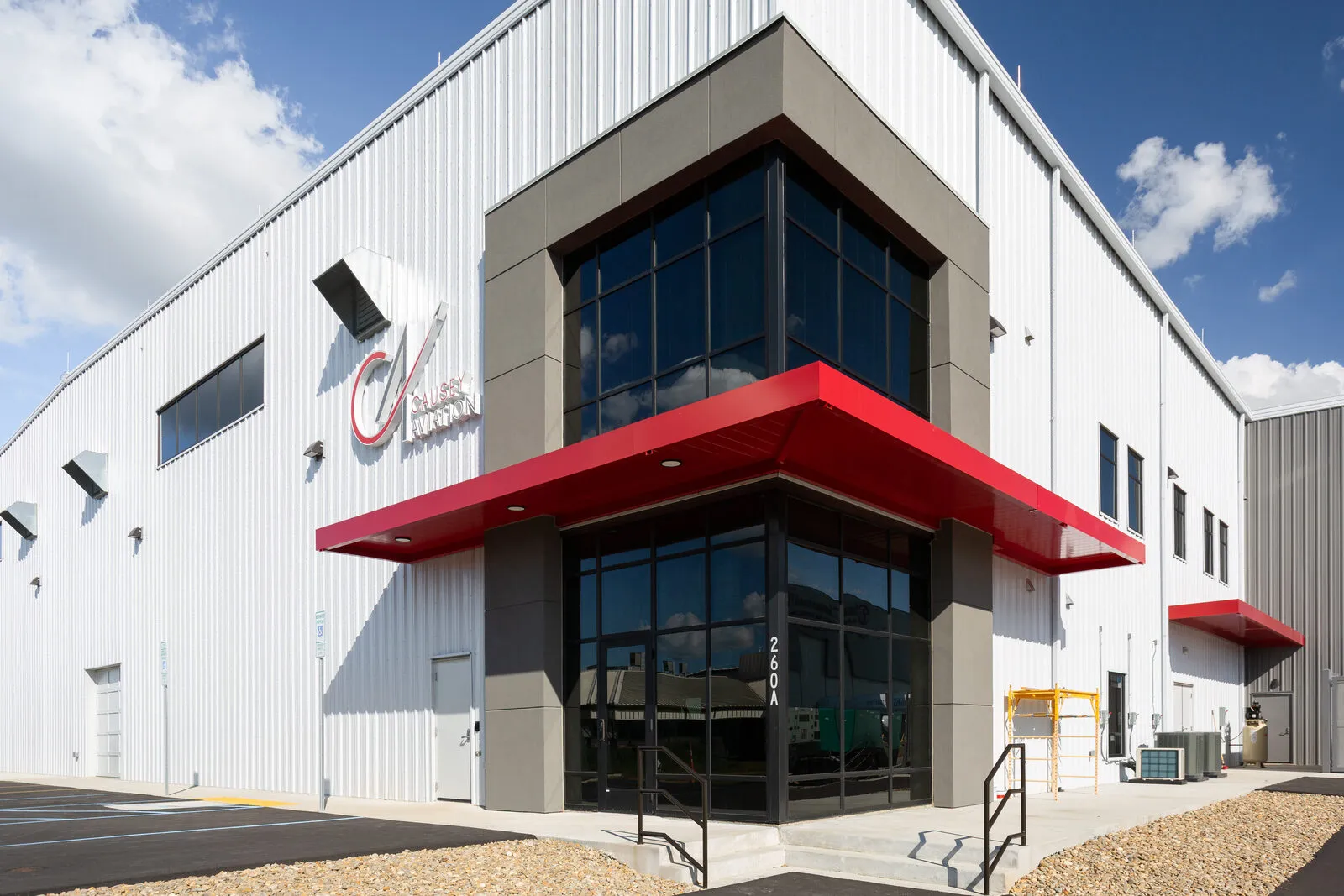Causey Aviation office entrance with red awning at 260A N. Regional Rd, Greensboro NC
